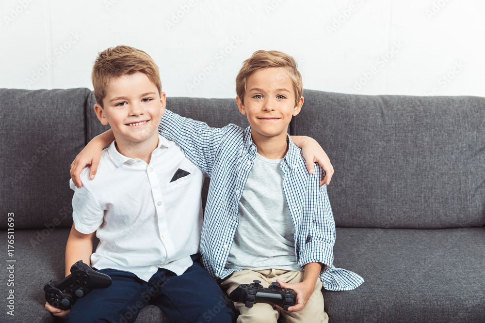 Wall mural boys playing with joysticks