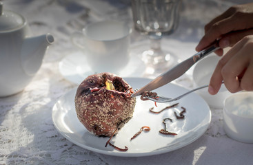 Halloween Vampire Monster Dracula Dinner Scary Gothic Table Setting Food Concept. Sterility and Dirt. Horrid Food Rotten Apple with Worms on White Plate. Insects on Fork in Restaurant.