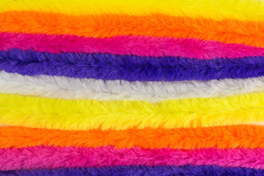 background of multicolored pipe cleaners