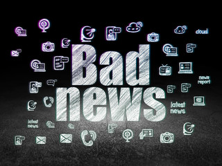 News concept: Bad News in grunge dark room