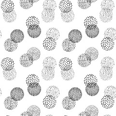 Moder simplistic geometric seamless pattern with overlapping doodle circles in black on white background