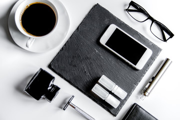smartphone, electronic cigarette and men's accessories top view