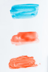 Set of watercolor brush strokes of blue and red paint on white background. Watercolor texture