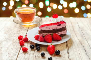 A festive cake with cherries