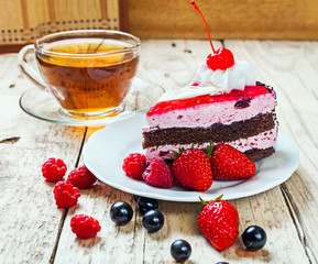 A festive cake with cherries
