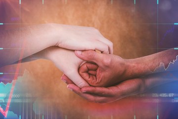 Fototapeta na wymiar Composite image of cropped hands holding together