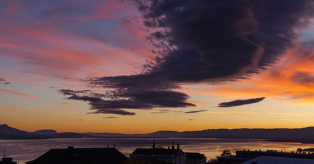 Dramatic sky at sunset. Lausanne city