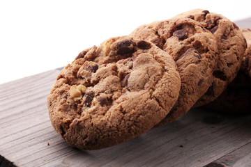 Chocolate cookies on wooden table. Chocolate chip cookies shot.