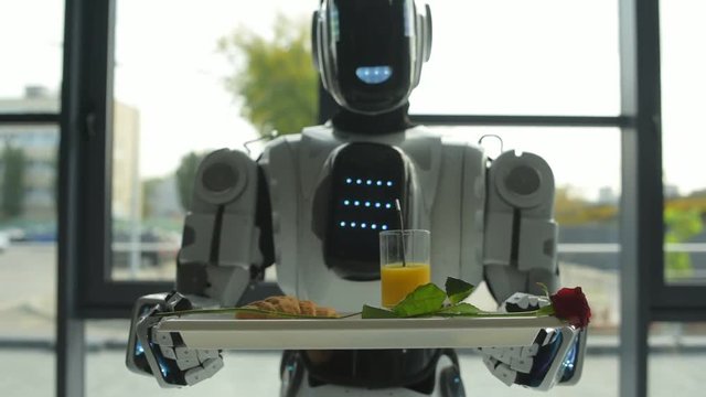 Automated robotic machine delivering romantic breakfast