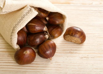 chestnuts on a wooden background