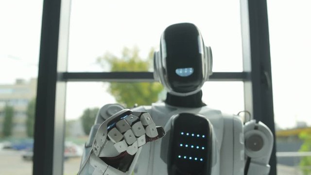 Friendly robotic machine waving hello