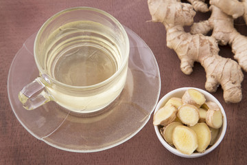 Ginger tea with sliced and ground roots - Zingiber officinale