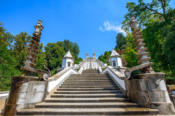Sanctuary of Bom Jesus do Monte on top of a monumental baroque staircase of 116 meters. Perspective view from down to up. Popular landmark and pilgrimage site in northern Portugal, Tenoes in Braga.