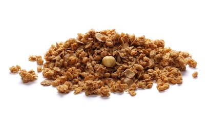 Crunchy granola, muesli pile with nuts isolated on white background