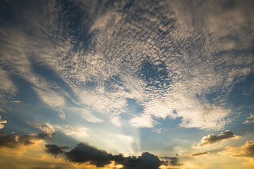 Fototapeta premium Sun rays through clouds like an dramatic explosion , power nature background.