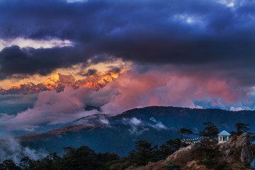 Dramatic landscape Kangchenjunga mountain with colorful from sunlight at Sandakphu