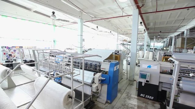Textile factory, textile industry, warping machine, cotton thread, cloth Manufacturing, sewing machines, textile machinery, equipment, weaving, loom? modern factory