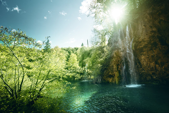 waterfall in forest, Plitvice Lakes, Croatia © Iakov Kalinin