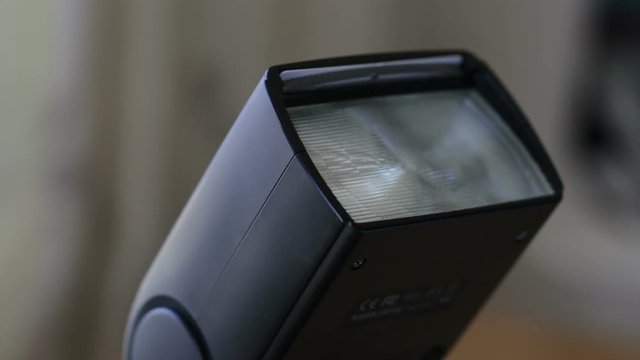 Flashing the built-in flash on the DSLR camera. Close-up