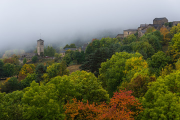 The small village of Fanlo (Huesca) wrapped between fog and vegetation