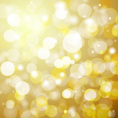 Abstract golden bokeh background with a light blur. Vector illustration