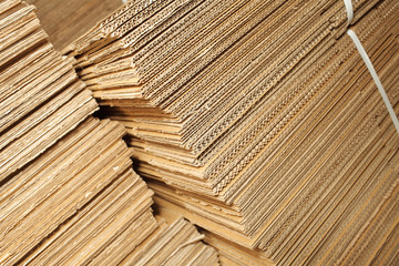 Stack of cardboard boxes, industrial background