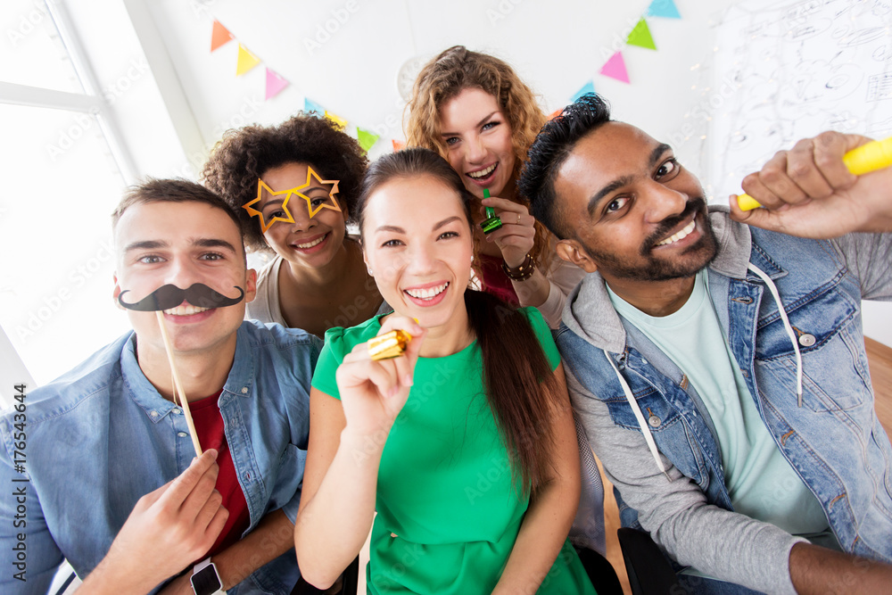 Poster happy friends or team having fun at office party