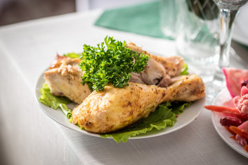 Baked chicken legs on a plate