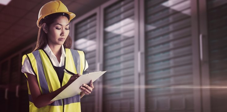 Composite image of architect woman with yellow helmet and plans