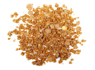 Crunchy granola, muesli pile with nuts isolated on white background, top view