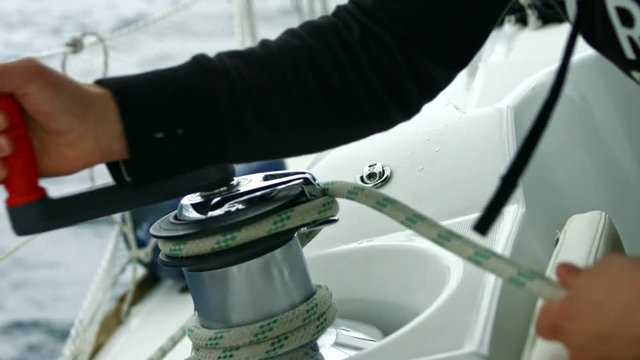 Operating sail winch on a yacht