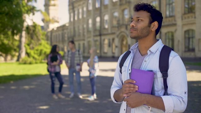 Biracial exchange student feeling lonely without friends at university abroad