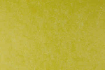 yellow paper background with silk fibres