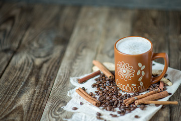 cappuccino coffee in a big brown mug
