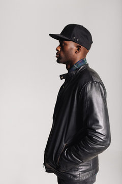 African male fashion model on grey background