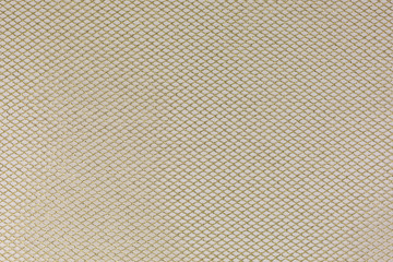 background of golden metallic mesh on white