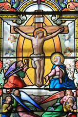 Jesus Christ on the cross. Stained glass window. Shrine of Our Lady of la Salette.