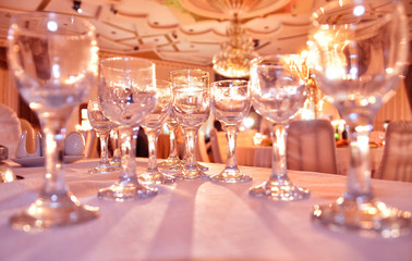 Crystal glasses on the table / Many empty glasses on a table, closeup