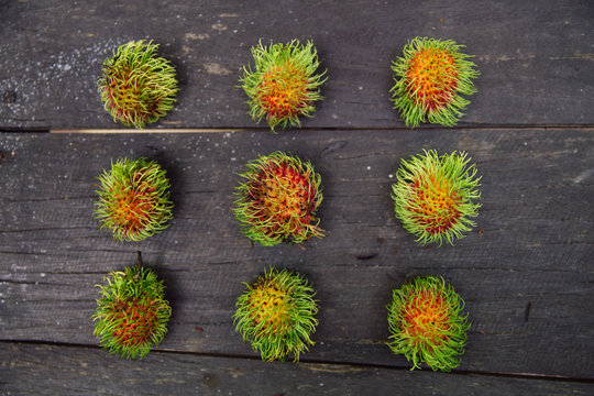 Arranged rambutan fruits
