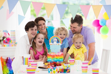 Obraz na płótnie Canvas Kids birthday party. Family celebration with cake.