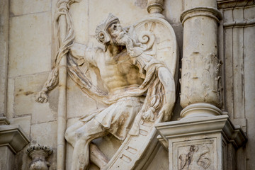 Tourism, Details of stone sculptures of the facade of the University of Alcalá de Henares. Madrid, Spain.