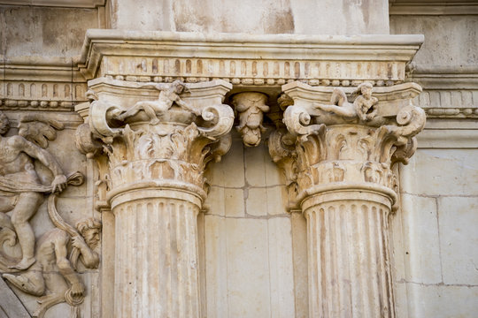corinthian capital, Details of stone sculptures of the facade of the University of Alcal&aacute; de Henares. Madrid, Spain.