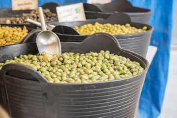 Olives at a traditional medieval fair in Alcalá de Henares, Madrid, Spain