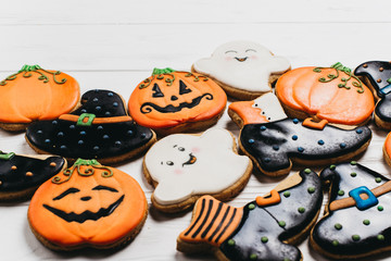Funny delicious ginger biscuits for Halloween on the table. horizontal view from above