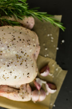 Seasoned raw chicken for roast chicken