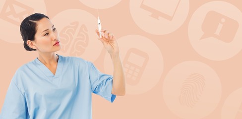 Composite image of serious doctor holding an injection in