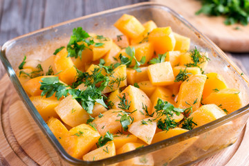 Baked pumpkin with aromatic herbs