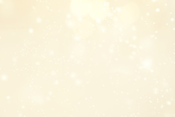 Gold christmas lights background with sparkling bokeh. Abstract defocused boke glittering shimmer.
