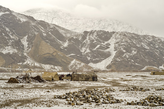 A hamlet Near Pakistan-Afghnistan Border Amidst Snowy Hills