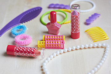  Shopping for a little girl. Lots of makeup on the table